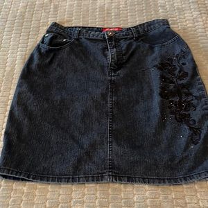 Size 8 Jean Skirt with design on the front and rear pickets